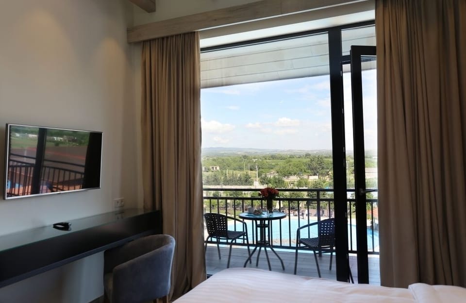 Family Suite | Minibar, in-room safe, desk, blackout drapes