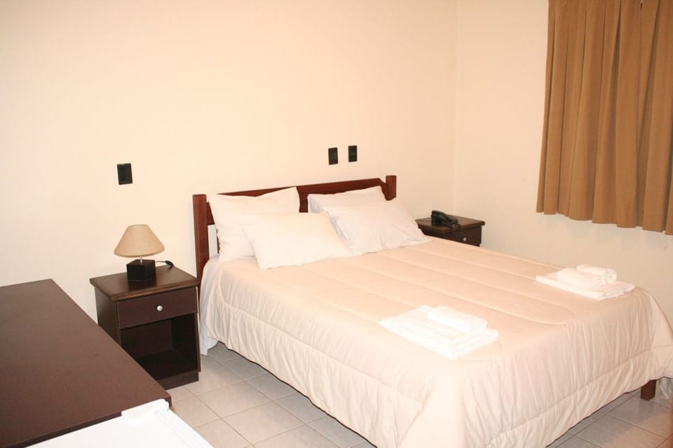 Double or Twin Room | Minibar, desk, blackout drapes, free WiFi