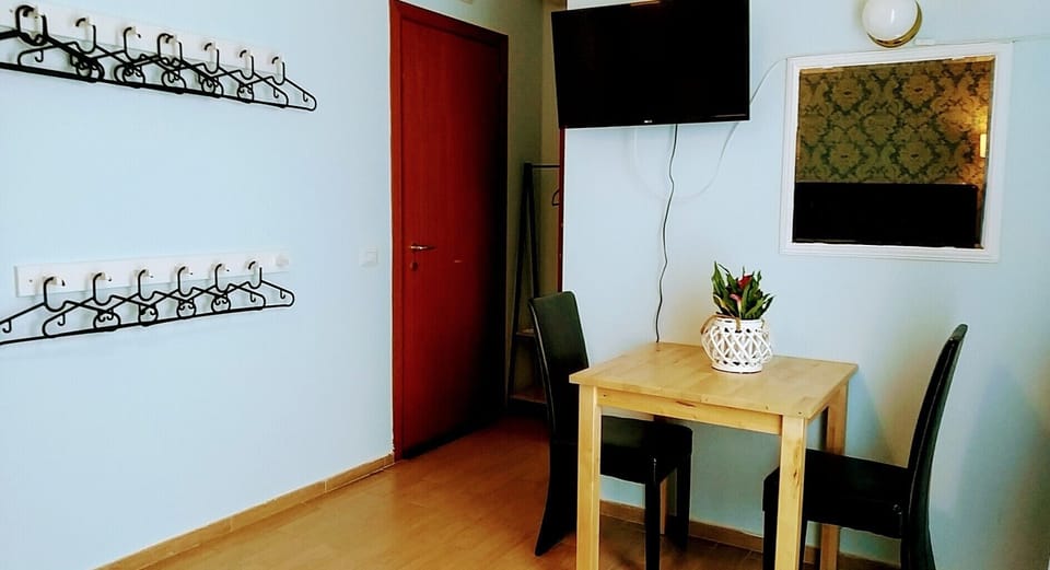Desk, iron/ironing board (on request), WiFi (free)