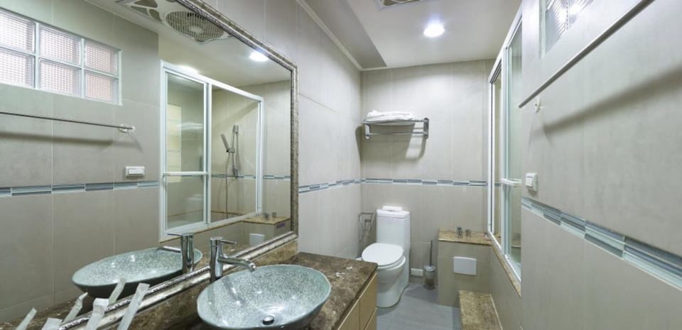 Shower, free toiletries, hair dryer, slippers