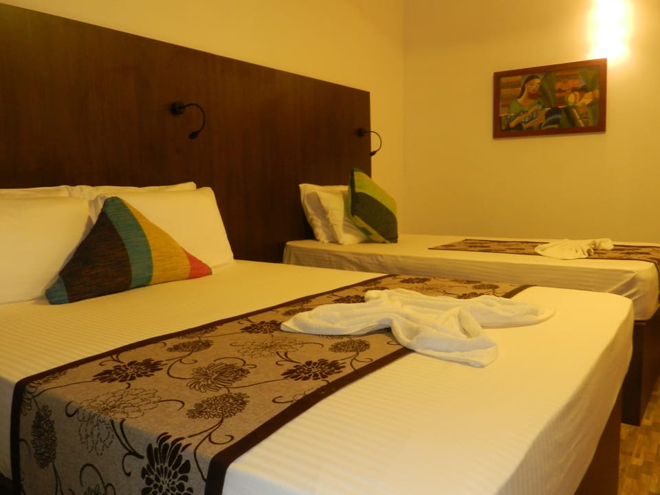 Deluxe Room, Mountain View | Desk, soundproofing, iron/ironing board, rollaway beds