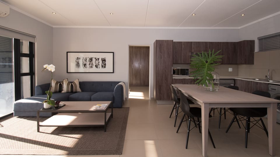 Basic Apartment, 1 Bedroom | Living area | 40-inch flat-screen TV with satellite channels, LED TV