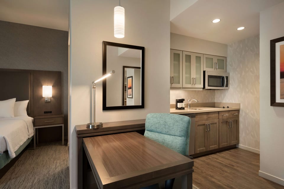 Full-size fridge, microwave, stovetop, dishwasher