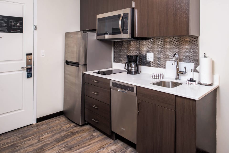 Studio, 2 Double Beds | Private kitchen | Full-size fridge, microwave, stovetop, dishwasher