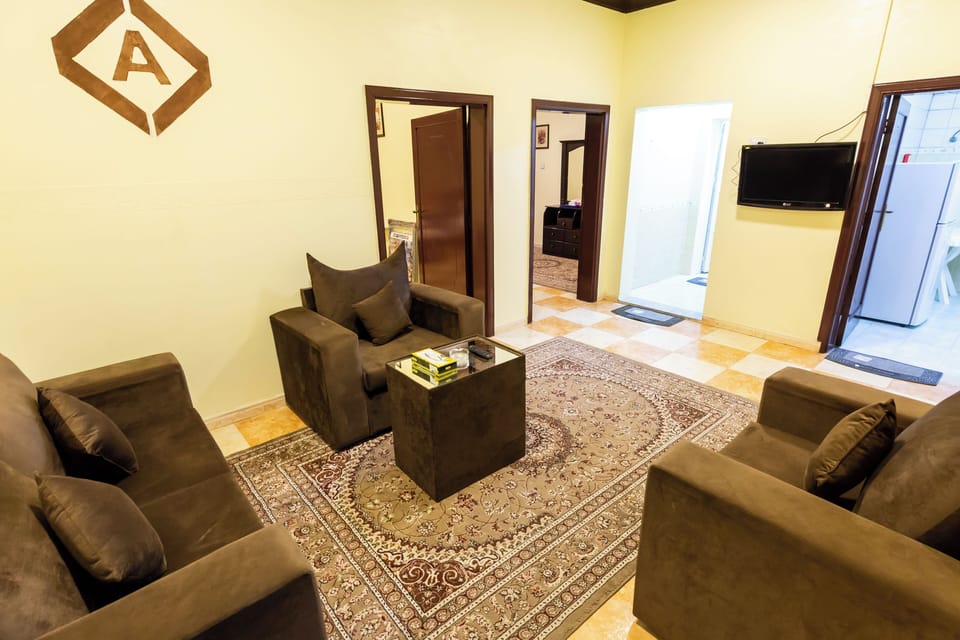 Apartment, 2 Bedrooms | Living area | TV