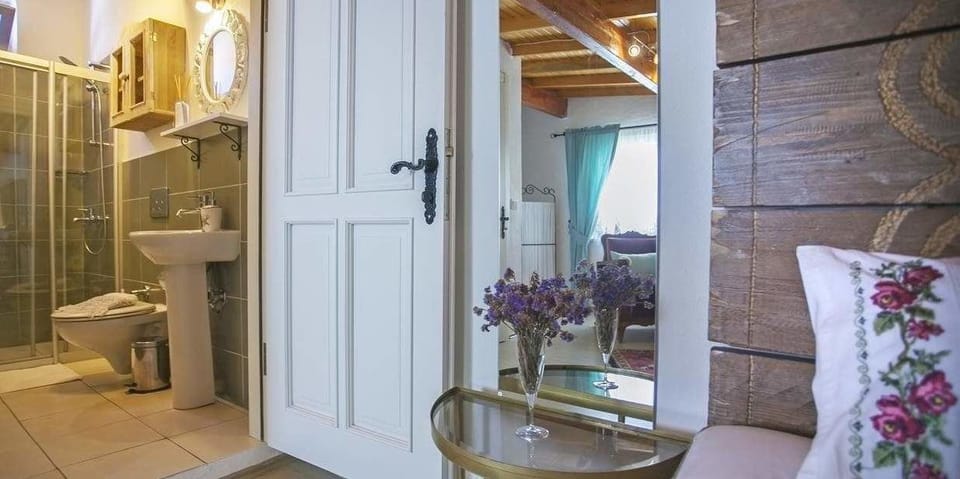Deluxe Double Room | Living area | Flat-screen TV