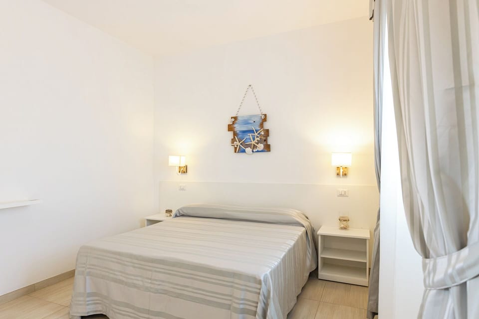 Superior Double or Twin Room, Pool View | Minibar, in-room safe, laptop workspace, blackout drapes