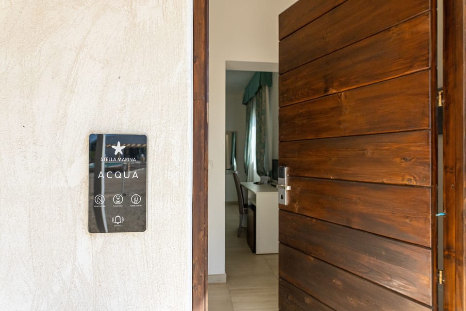Superior Double or Twin Room, Pool View | Minibar, in-room safe, laptop workspace, blackout drapes