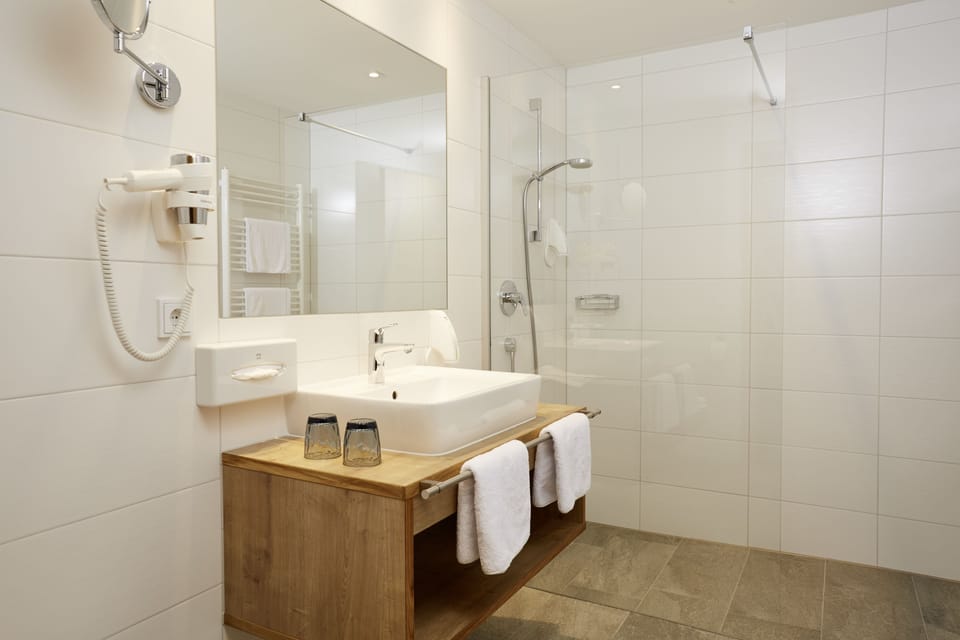 Shower, free toiletries, hair dryer, bathrobes