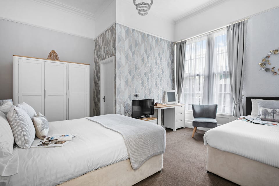 Family Room (2 Adults + 1 Child) | Premium bedding, minibar, blackout drapes, iron/ironing board