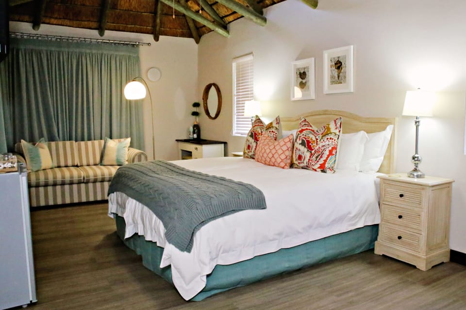 Family Room | 1 bedroom, premium bedding, minibar, in-room safe