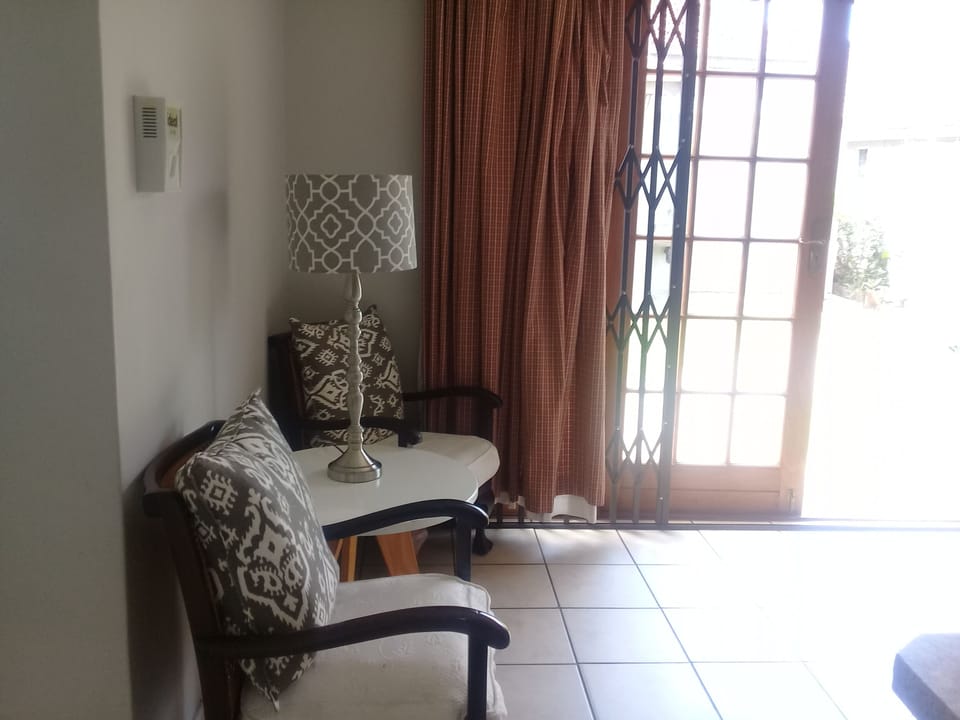 Cottage @ 23 | Living area | 32-inch LED TV with satellite channels, TV