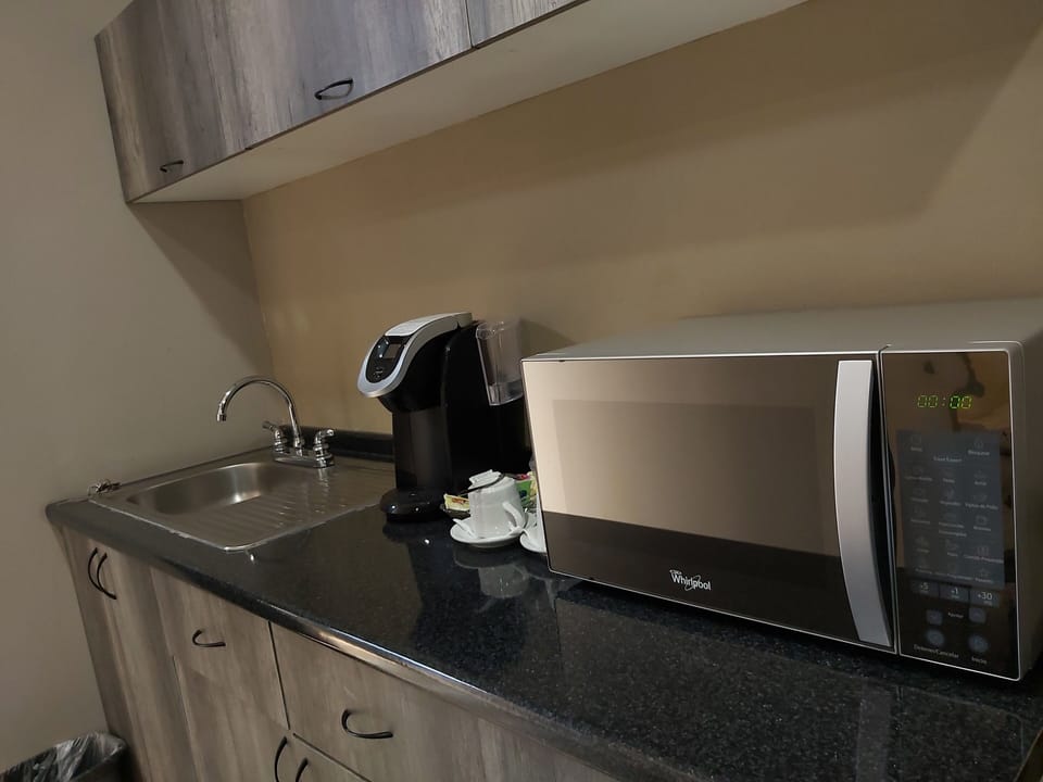 Design Suite, 1 Bedroom, Bathtub, Ground Floor | Private kitchen | Espresso maker, coffee/tea maker
