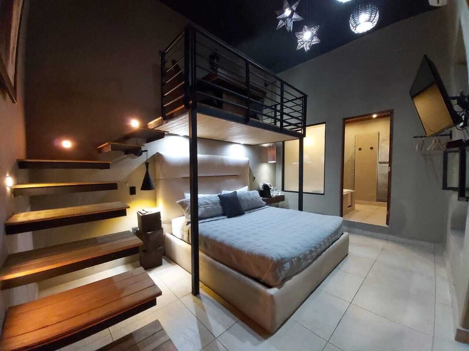 Design Suite, 1 Bedroom, Bathtub, Ground Floor | Premium bedding, down comforters, in-room safe, individually decorated