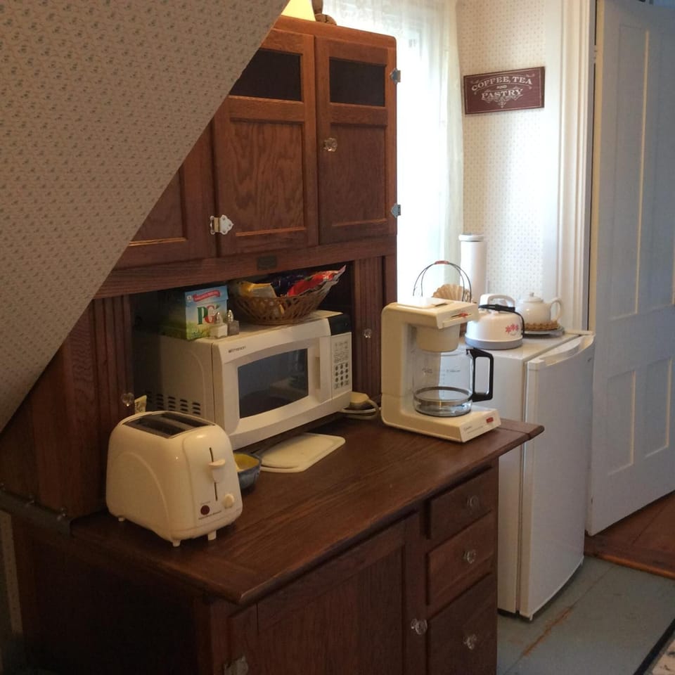 Shared fridge, microwave, coffee/tea maker, electric kettle