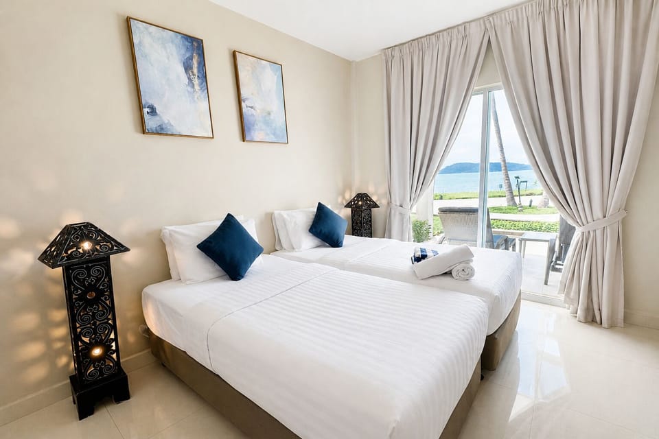 Family Beach Suite | Minibar (free items), in-room safe, desk, laptop workspace