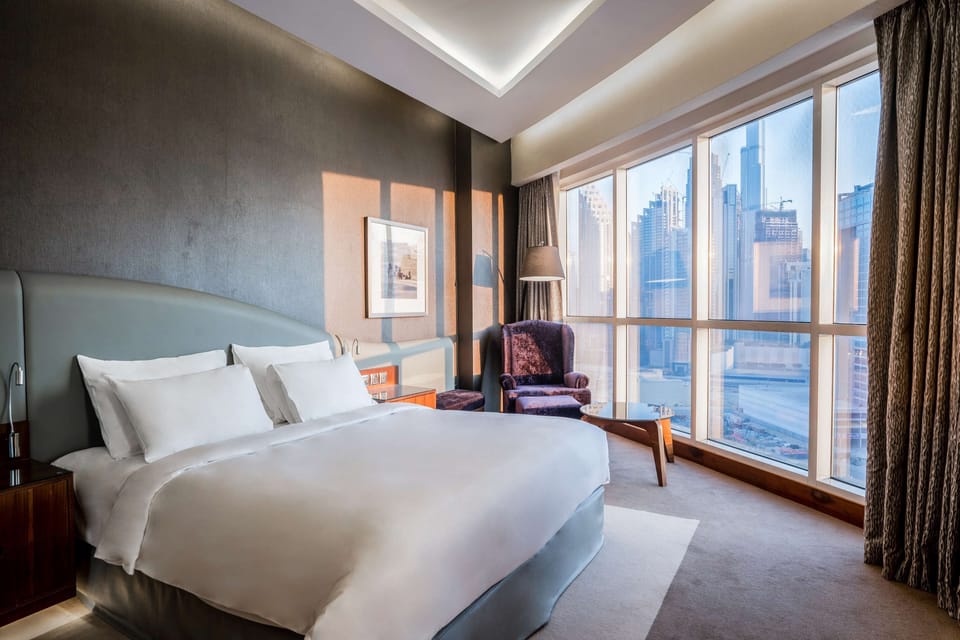 Premium bedding, pillowtop beds, minibar, in-room safe