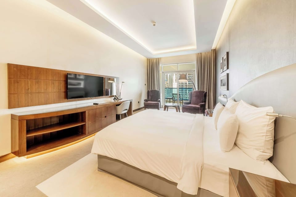 Premium bedding, pillowtop beds, minibar, in-room safe