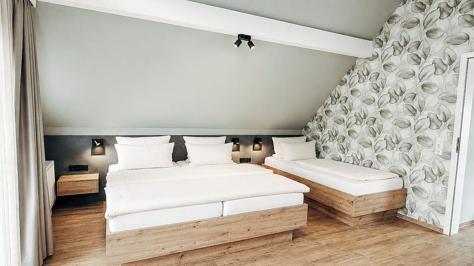 Family Suite, Balcony | Premium bedding, minibar, in-room safe, free WiFi