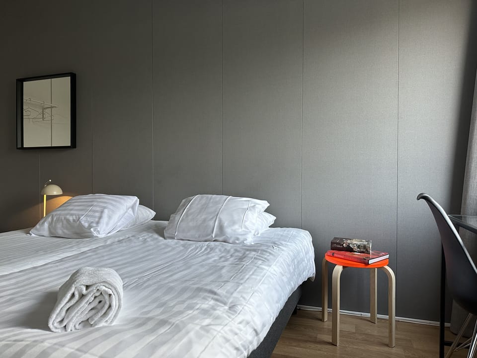 Twin Room, Shared Bathroom | Desk, blackout drapes, iron/ironing board, free cribs/infant beds