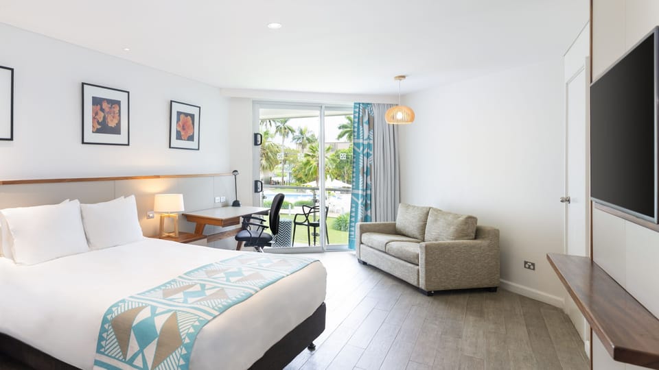 Room, 1 Queen Bed with Sofa bed (Ocean Sunset View) | Minibar, in-room safe, desk, blackout drapes