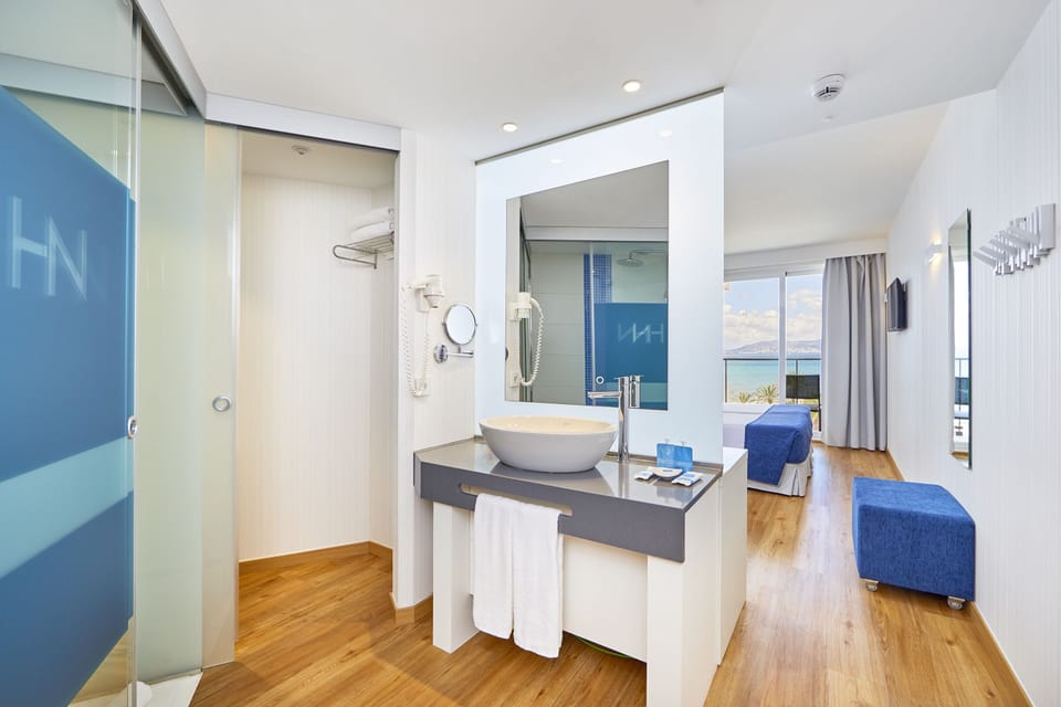 Double Room, Partial Sea View | Bathroom | Shower, free toiletries, hair dryer, towels