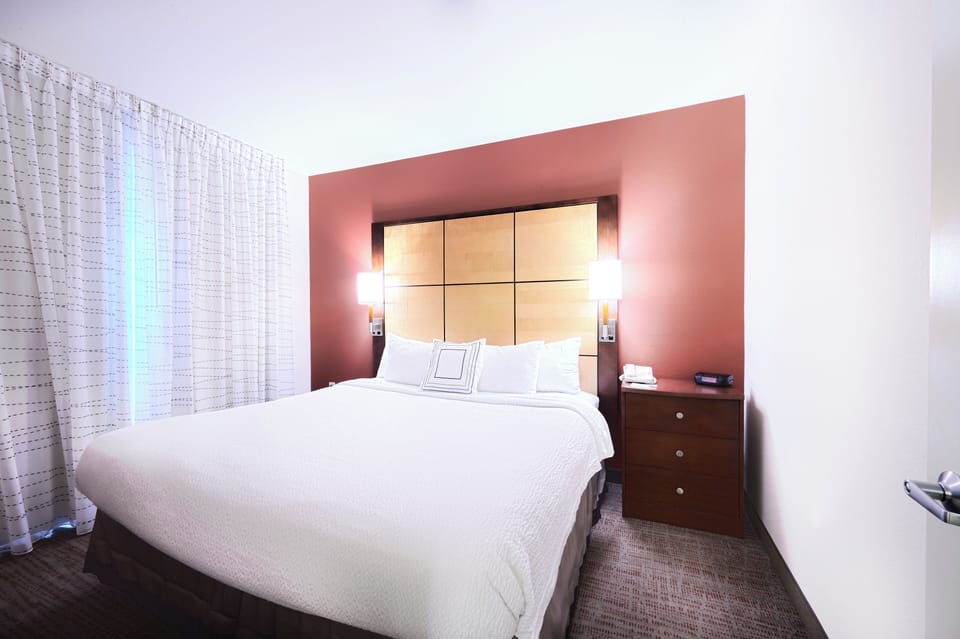 Suite, 1 Bedroom | Desk, blackout drapes, iron/ironing board, cribs (free)