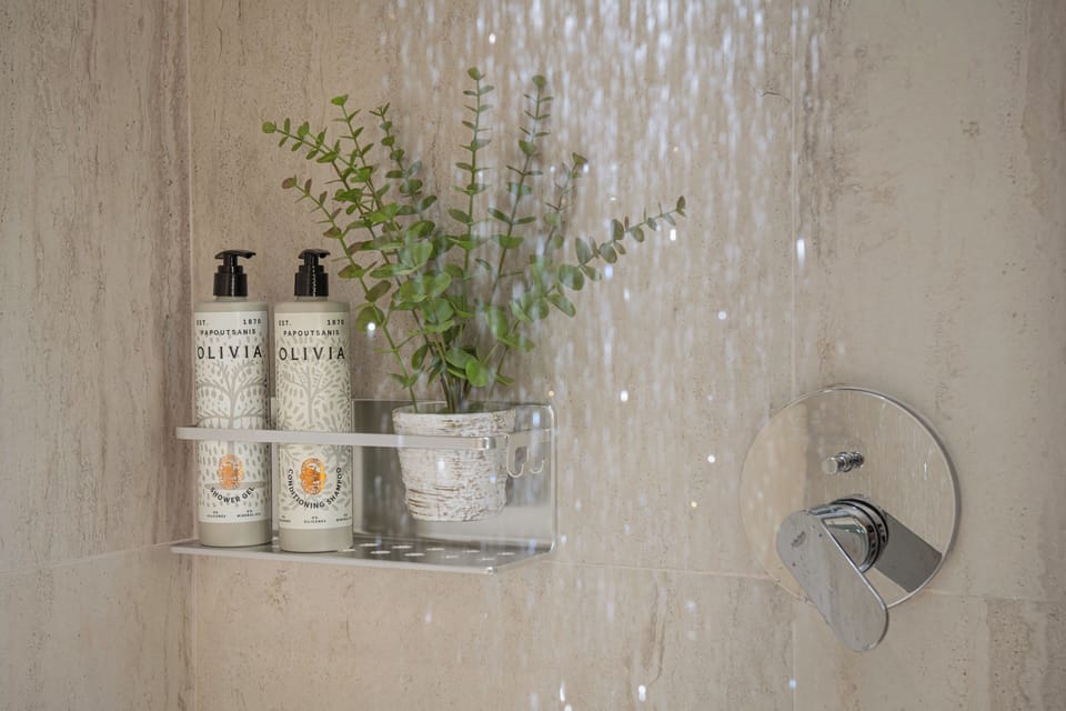 Bathtub, deep soaking tub, hair dryer, towels