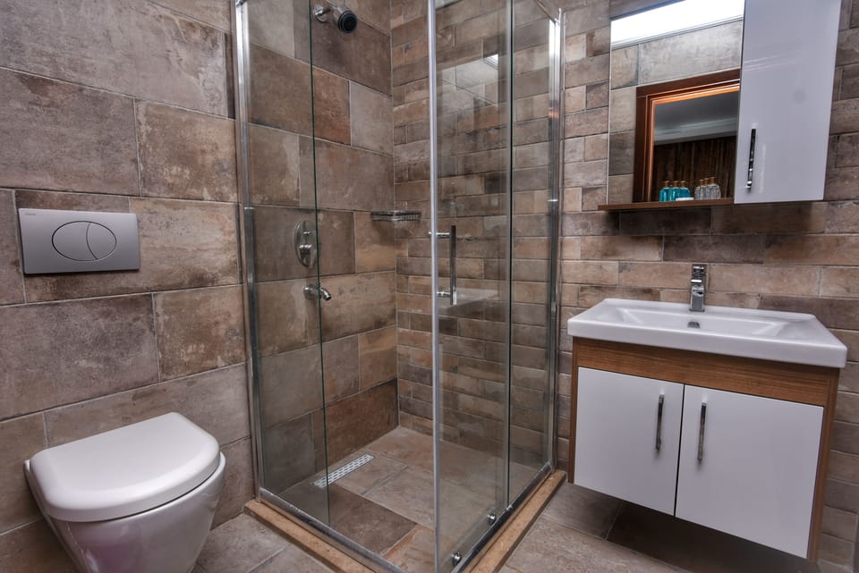 Family Triple Room, Sea View | Bathroom shower