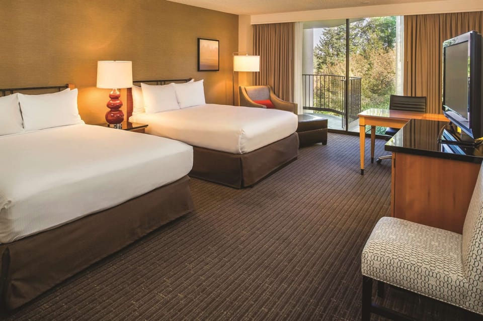 Premium bedding, down comforters, pillowtop beds, desk
