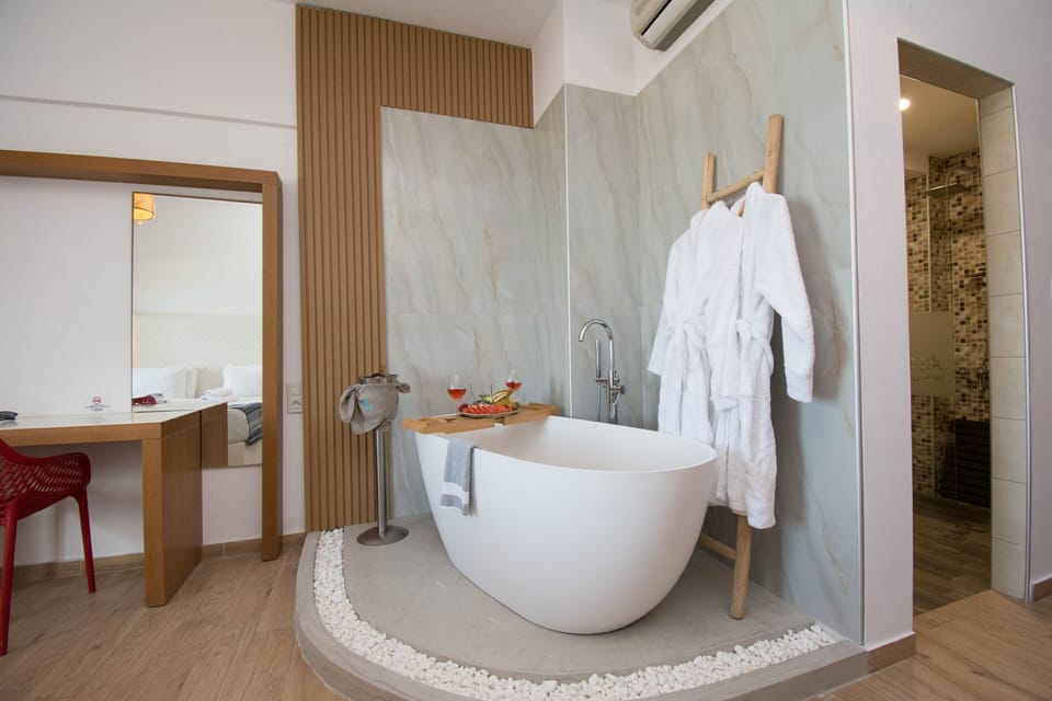 Junior Suite, 1 Queen Bed, Bathtub, Sea View | In-room safe, laptop workspace, soundproofing, free WiFi