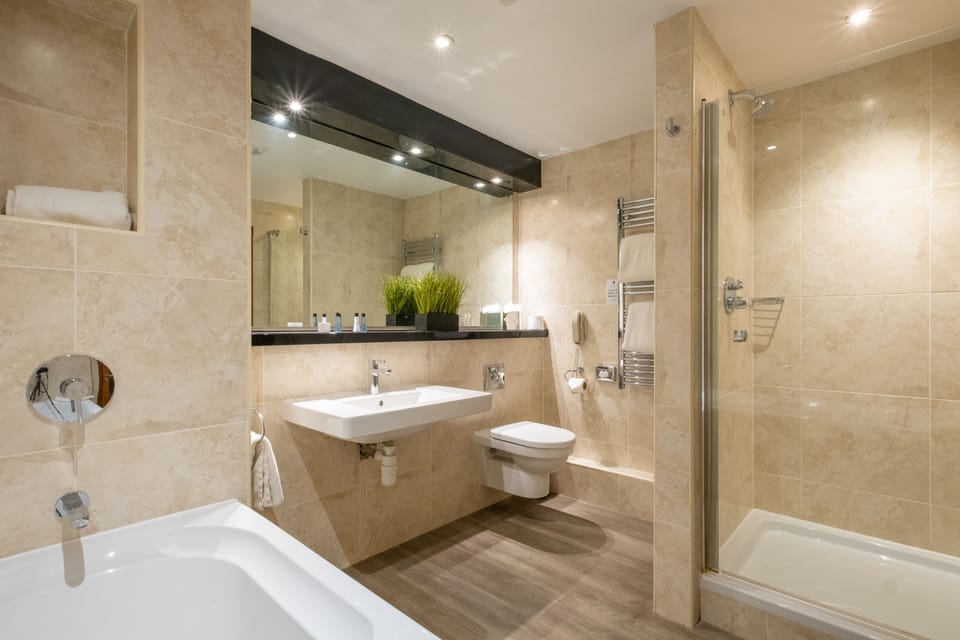 Separate tub and shower, free toiletries, hair dryer, towels