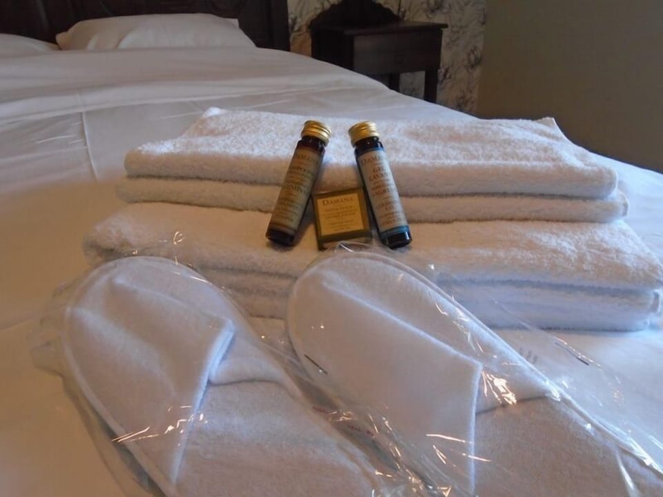 Shower, free toiletries, hair dryer, slippers