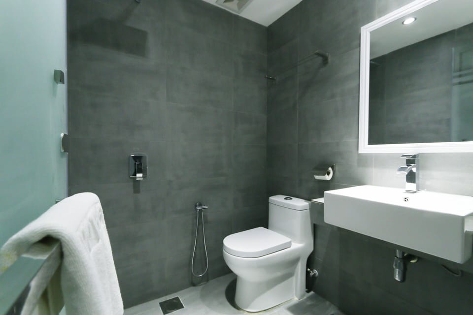 Standard Queen  | Bathroom | Shower, free toiletries, hair dryer, slippers