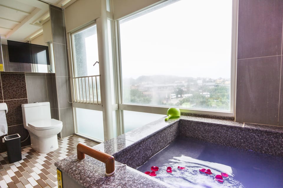 Family Triple Room (With hotspring) | Bathroom | Separate tub and shower, spring water tub, free toiletries, hair dryer