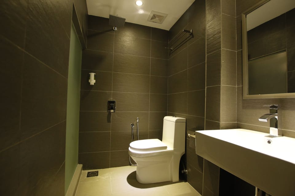 Shower, free toiletries, hair dryer, slippers