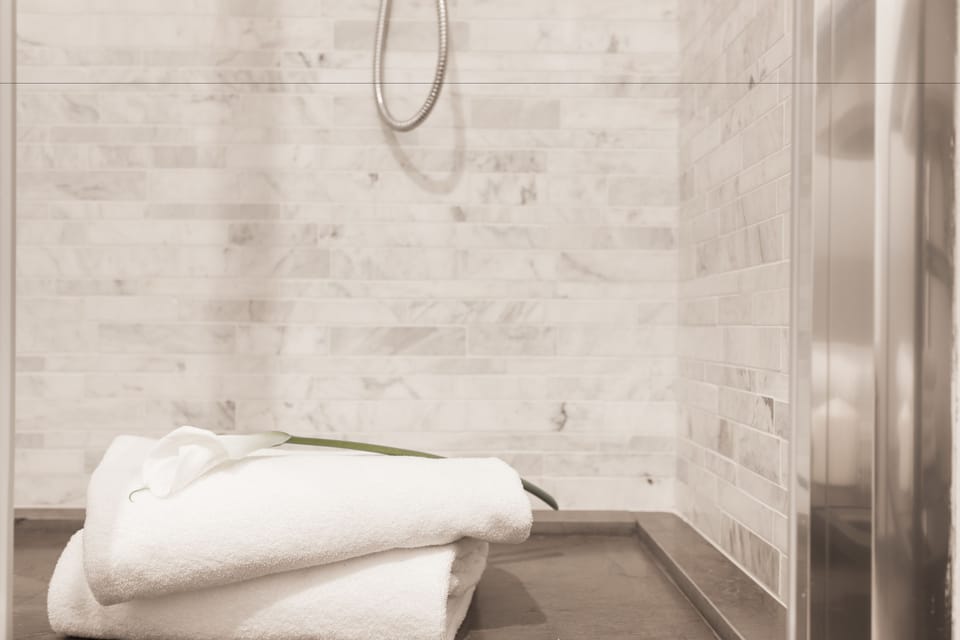 Exclusive Suite, Terrace, City View | Bathroom | Shower, rainfall showerhead, designer toiletries, hair dryer