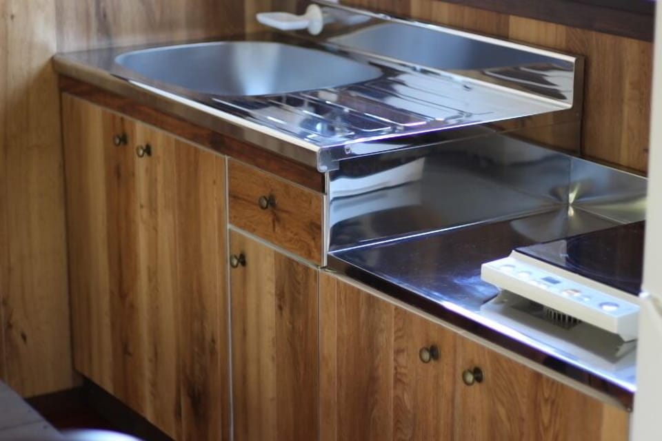 Triple Room, Non Smoking | Private kitchenette | Full-size fridge, microwave, oven, stovetop