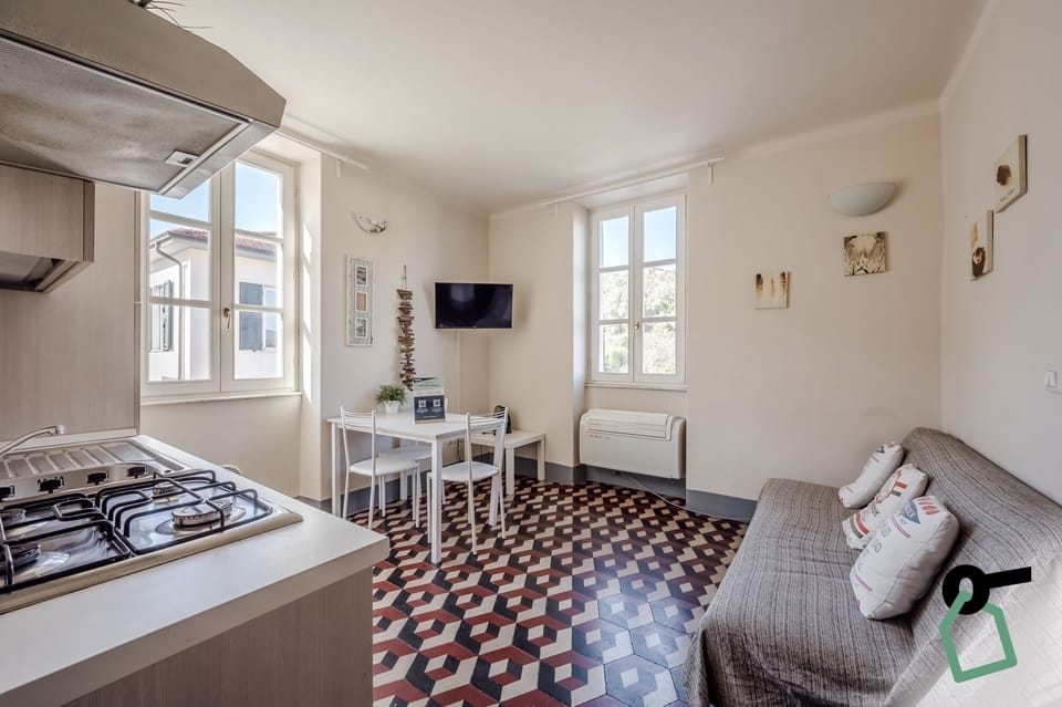 Apartment, 1 Bedroom | Living area | Flat-screen TV