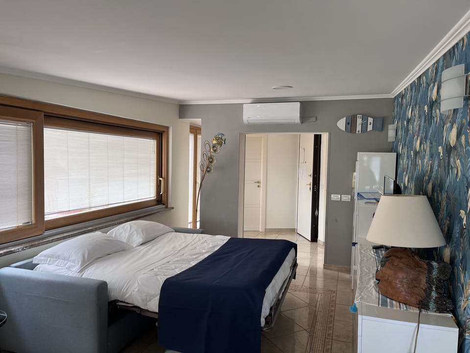 Panoramic Condo, Beach View, Sea Facing | Living area | Flat-screen TV