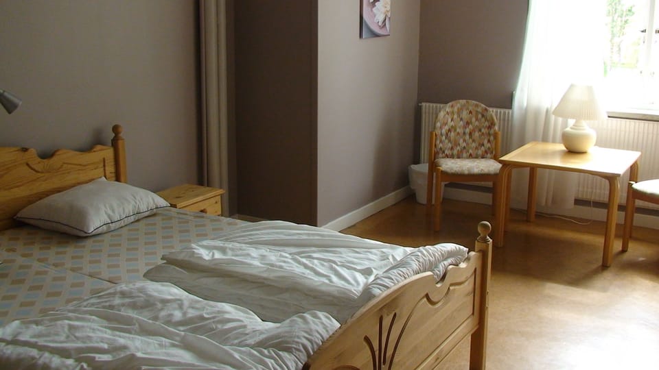 Quadruple Room, Shared Bathroom | Blackout drapes, soundproofing, free WiFi