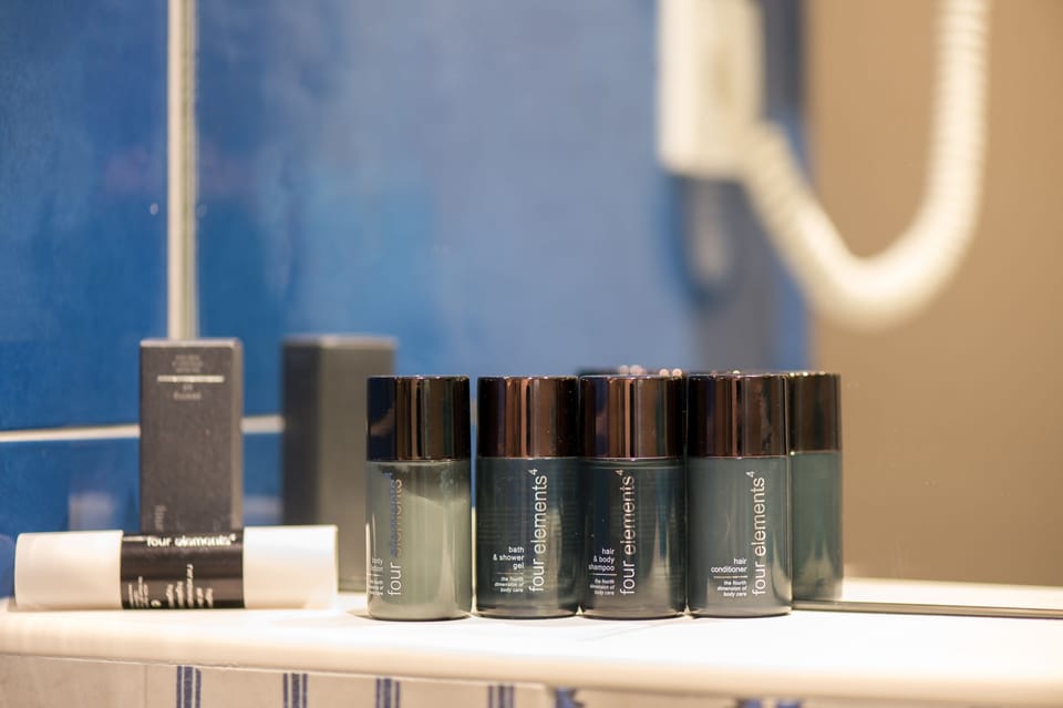 Duplex Dream Suite | Bathroom | Shower, eco-friendly toiletries, hair dryer, towels