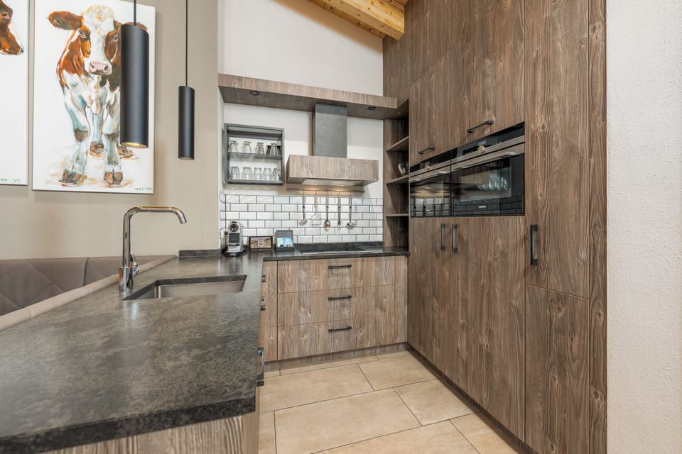 4-bedroom penthouse with private sauna | Private kitchen | Espresso maker, coffee/tea maker, electric kettle, highchair