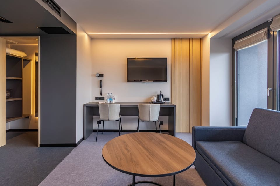 Premium Double Room | Desk, laptop workspace, blackout drapes, iron/ironing board