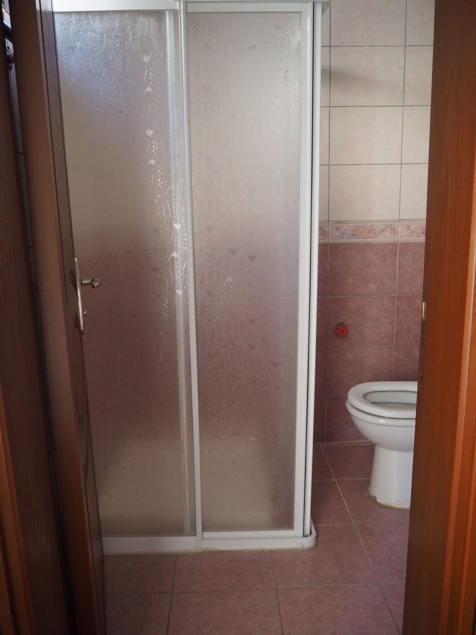 Shower, designer toiletries, hair dryer, slippers