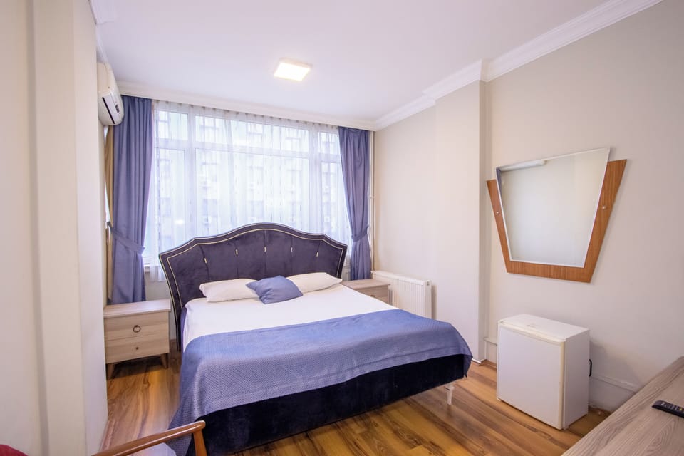 Double or Twin Room, 1 Double or 2 Twin Beds | Minibar, in-room safe, desk, laptop workspace