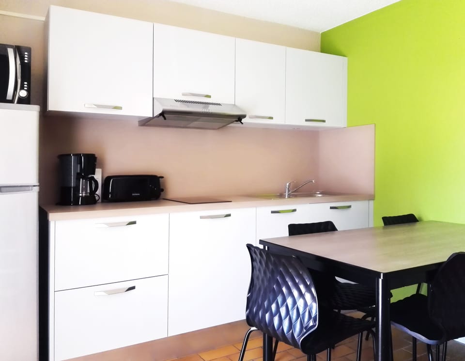Superior Apartment, 2 Bedrooms | Private kitchen | Full-size fridge, microwave, stovetop, coffee/tea maker