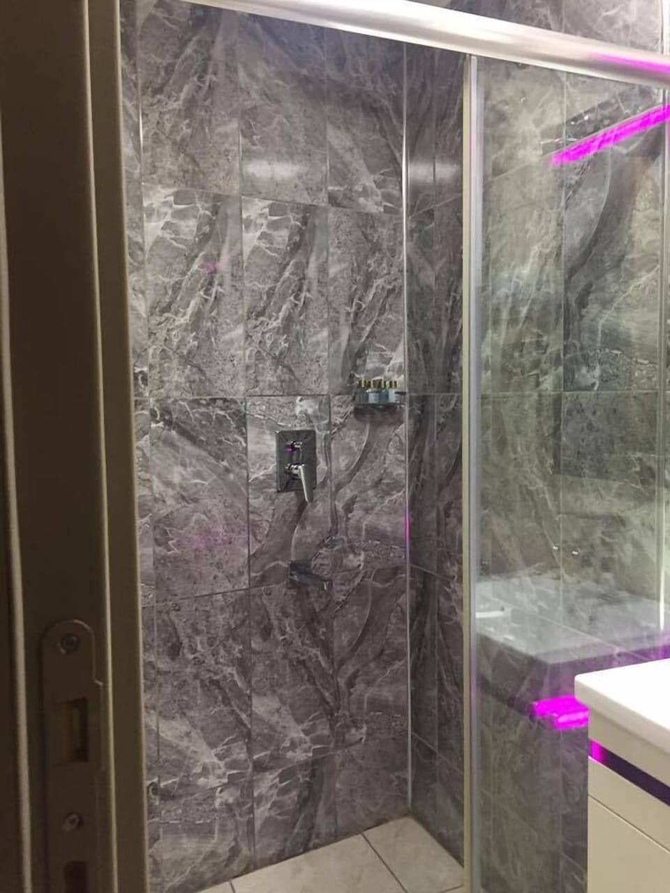 Shower, free toiletries, hair dryer, slippers
