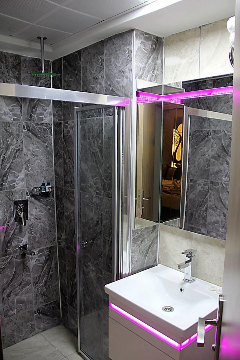 Shower, free toiletries, hair dryer, slippers