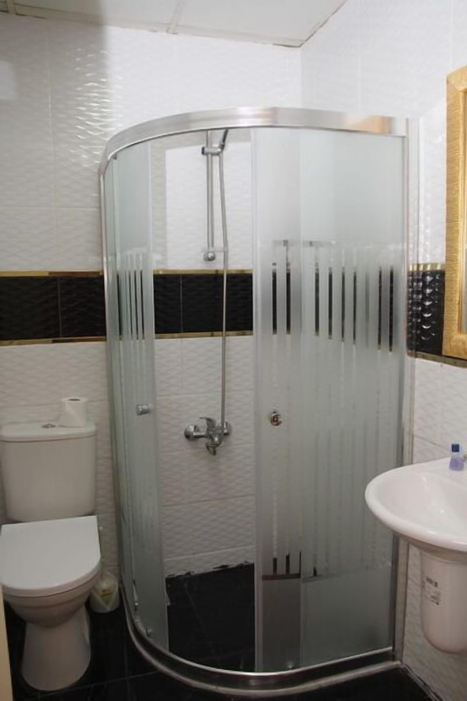 Shower, free toiletries, hair dryer, slippers